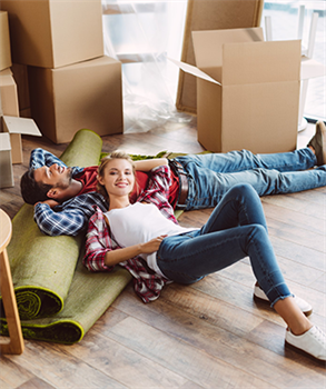 A couple moving home