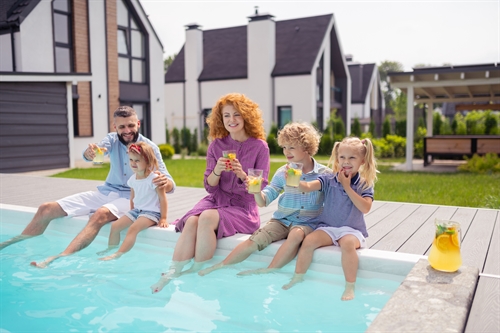 A family enjoys hot weather in the garden