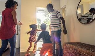 A family enjoying their tidy hall