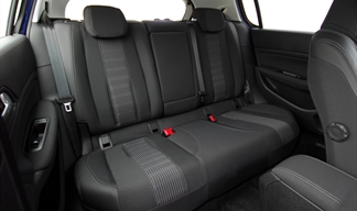 A clean and tidy car interior, backseat